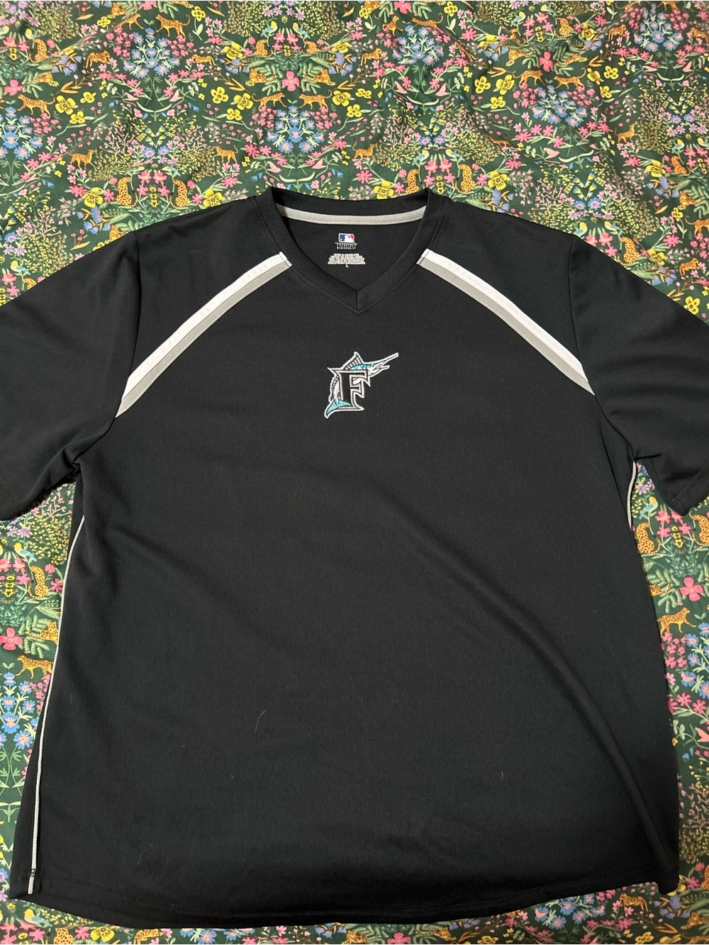 vintage Genuine Merchandise MLB Miami Marlins blac and silver sz L warmup jersey